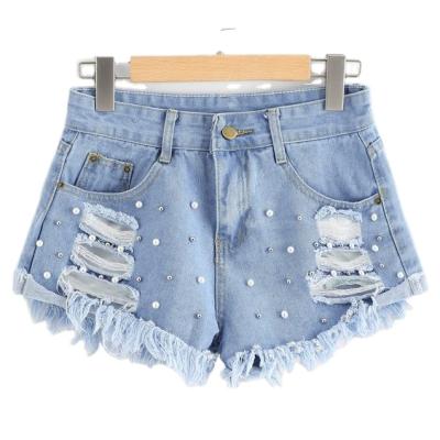 China Color Fade Proof High End Casual Trendy Beading Blue Washed Short Ripped Jeans For Women And Girl for sale