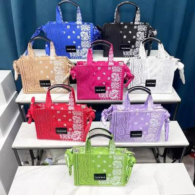 China Famous cashew flower women purse 2022 bandanna summer shopping brand new arrival fashion tote handbag and designer handbags for sale