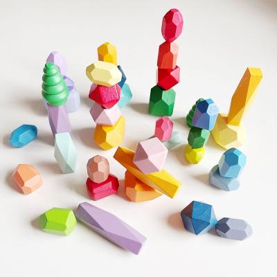 China Eco-friendly Material Wooden Rainbow Stacking Stones Building Blocks Kids Colorful Montessori Toys Early Learning Educational Toys For Baby Toddlers for sale