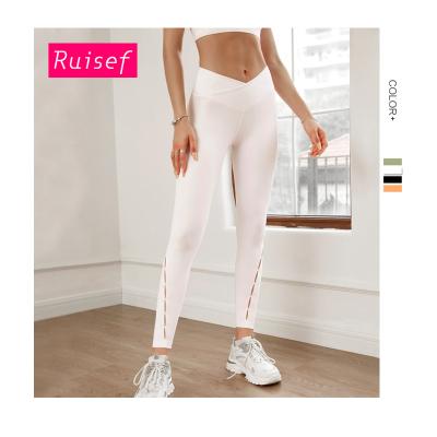 China European and American breathable peach hip lift fitness pants women's high waist nude elastic sports running quick-drying yoga pants for sale