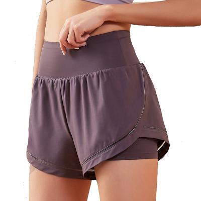 China Two-piece women's yoga fitness clothes breathable loose-drying woven sports shorts anti-light sports shorts summer new for sale