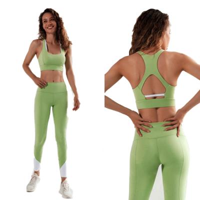 China New breathable color contrast sports bra shockproof quick-drying pants yoga fitness hip-lifting suit for sale