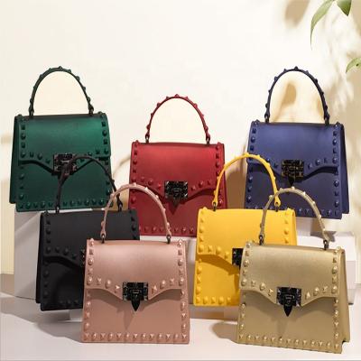 China Lady 2021 Jelly PVC Handbag Summer Special Women's Bag Mobile Phone Bag Color Diamond Rivets Mini Handbag Shoulder Bag for sale