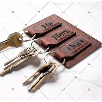 China Vintage Holder Men Accessories Keychains Durable Customized Genuine Leather Keychains Genuine Leather Key Set for sale