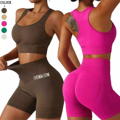 China 2022 New Model Women Compression Breathable Solid Color Fashion Stretchy Fitness Ribbed Yoga Sports Bra And Leggings Set for sale