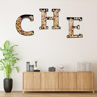 China Sustainable Metal Wine Cork Holder Decorative Wall Letter Wine Bottle Cork Holders for sale