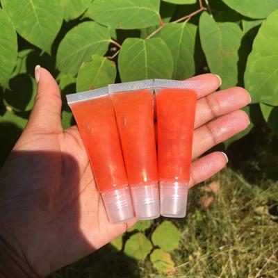 China Cosmetics Wholesale Vegan Custom Light Pink Label Shimmer Mini Squeeze Lipgloss Tube Lip Gloss Dropping Gloss for sale