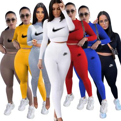 China 2021 Breathable Hot Sale Ladies Solid Color Teams Two Piece Pants Set Women Clothing Winter Biker Pants 2 Piece Set for sale