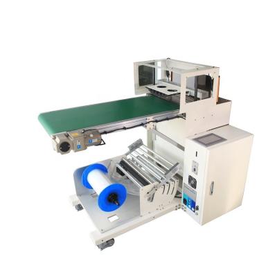 China Waterproof Black Wholesale Commodities Express Mailing Bags Machine Price Automatic Horizontal Messenger Sealing Machine for sale