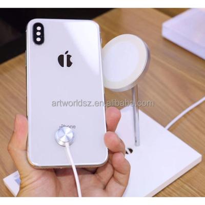 China mobile phone shop phone stand with alarm wireless charge phone stand for sale