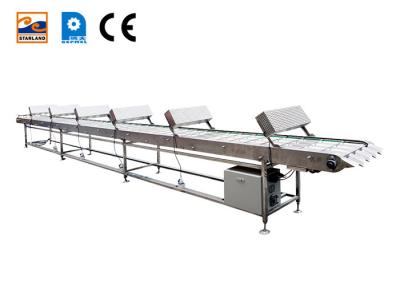 中国 Stainless steel column cooling conveyor belt with cooling fan 販売のため