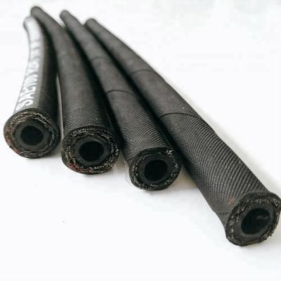 Chine Best quality manole high pressure synthetic weather resistant fabric 2SN 6mm R2AT-04 SAE rubber hydraulic rubber hose for sale à vendre