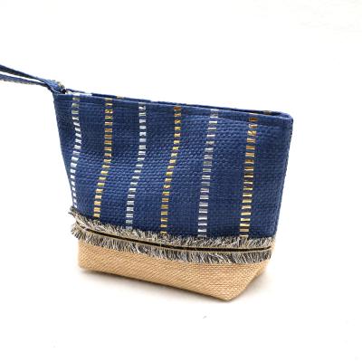 China ENGLAND STYLE Waterproof Tassel Design Printed Paper Straw Cosmetic Bag Make Up Women Zipper Beach Hand Carry Bag for sale