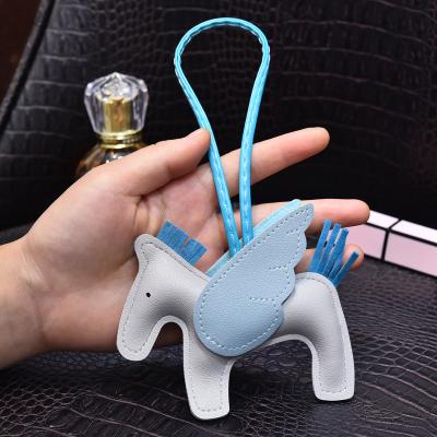 China Custom Unicorn Pu Leather Key Chains Leather Car Key Holder Brand Designer Car Key Chain Small Horse Bag Key Chain Charm for sale