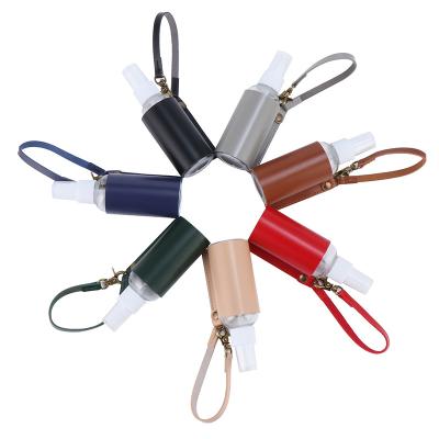 China Custom Leather Key Holder Car Key Chain Key Ring Kids PU Leather Key Chains Hand Sanitizer Holder Key Chain Colorful White For Teens for sale