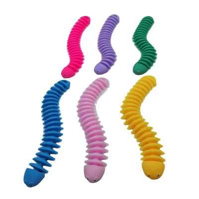 China Squeeze New TPR Decompression Dinosaur Bone Soft Stretch Wristband Wiggle Sensory Stretch String Noodles Stress Toys For Adults for sale