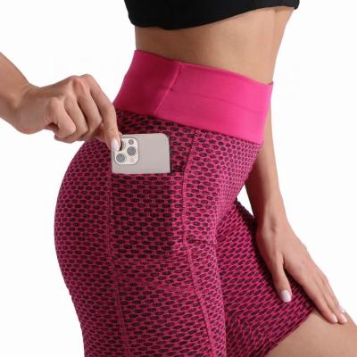 China Breathable women fitness butt booty crack! crack! shorts gym workout high waist leggings see no through bubble yoga shorts with pockets for sale