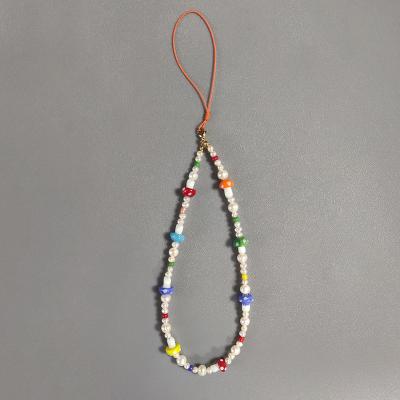 China Eco-Friendly Manufacturer Emptying Newest Pure Natural Pearl Mobile Phone Decoration Chain Charm Handmade Beaded Gifts For Mothers Day for sale