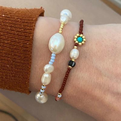 China Lead Free Handmade Red Rice Bracelet Natural Freshwater Pearl Nickel Free Embellished Pearl For Women Flower Beaded Bracelet Charm Retro Jewelry for sale