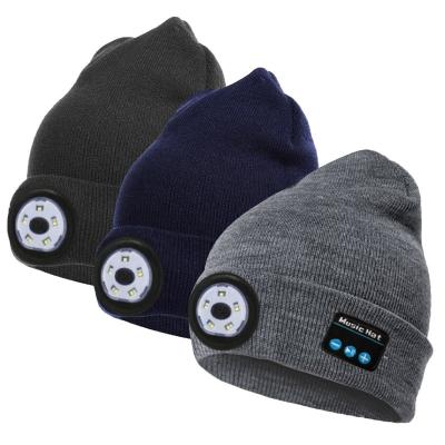 China 2022 COMMON Earbuds Warm Black Cordless Winter Mens Womens Knitted Beanie Hats Music Hat Cap With LED For Christmas Gift for sale