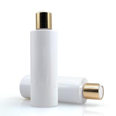 China Cosmetic white facial lotion pet bottles round 120ml 100ml toner cosmetic bottle with gold disc cap bottle for sale