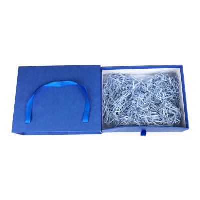 China Packing Items Custom Design Logo Blue Paper Box With Ribbon Handle for sale