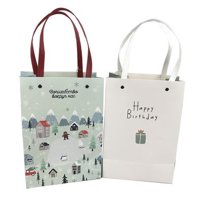 China Recycled Materials Customized Foldable Paper Gift Bag With Handle for sale