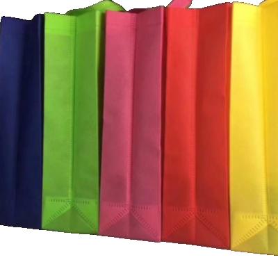 China Cheap Custom Cheap Plain Eco Handled Biodegradable T-shirt Heat Seal T-shirt u Cut Non Woven Bag for sale