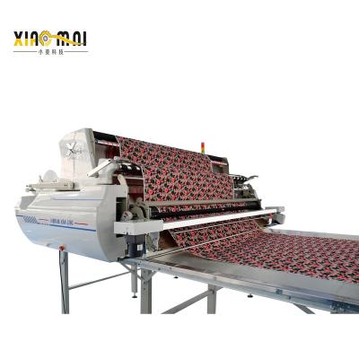 China Textile industry cnc automatic fabric spreader for fabric paving machine for garment automatic cutting machine for sale