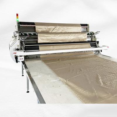 China Garment Shops More Diapers Automatic Cloth Cutting Machine Local Service Cloth Spreading Spreading Machines for sale