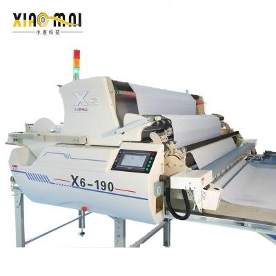 China New High Effeciency Cutting XM-X6 Automatic Tissue Machine Manual Hot Selling Spreading Machine for sale