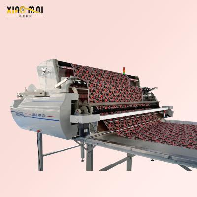 China Garment Shops XM-X6 Smooth Safe and Safe Cloth Relaxing Servo Motor Cloth Cloth Spreading Machine for sale