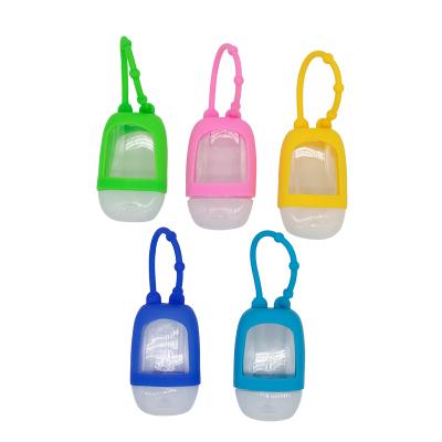 China Fashion and factory price 30ml silicone hand sanitizer easy grip bottle holder (clip on handbag) for sale