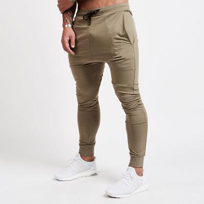 China Viable Wholesale Sports Training Men Running Gaiters Workout Fitness Pants Gym Gym Plus Size Mens Trousers And Slacks for sale