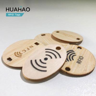 China Waterproof / Waterproof HUAHAO RFID Manufacturer OEM Customized UHF 13.56MHZ Bamboo NFC Custom Business HF Wood CARD Logo Engraved for sale