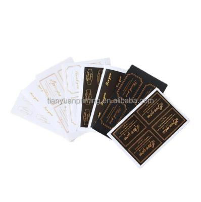 China Waterproof Custom Self Adhesive Ring Laminated Paper Self Adhesive Printing Transparent Label for sale