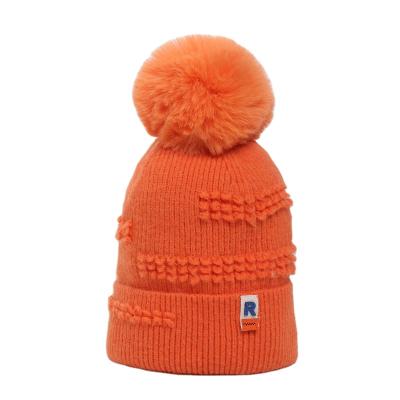 China BSC0117 COMMON pure color fashion high quality women's winter knitted hats with fur pom poms for sale