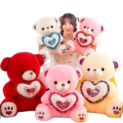 China Home Day Music LED Teddy Bear Plush Toys Valentine Gifts AIFEI TOY Creative Luminous Decoration With Heart Soft 30cm Personalized Teddy Bear for sale