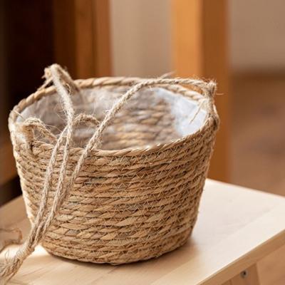 China Sustainable Factory Produced Exquisite Unique Storage Basket Straw Woven Basket Natural Flower Pot for sale