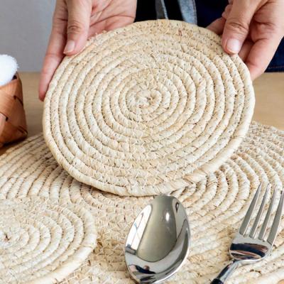 China Handmade Kitchen Rattan Coaster Set Place Mat Sea Grass Round Sustainable for sale