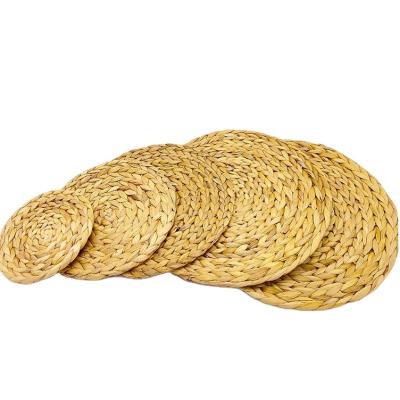 China Handmade Kitchen Rattan Coaster Set Place Mat Sea Grass Round Sustainable for sale