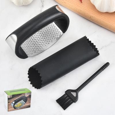 China Hot Selling Chamber Kitchen Cooking Tool Metal Garlic Chopper Crushing Stainless Garlic Press For Kitchen for sale