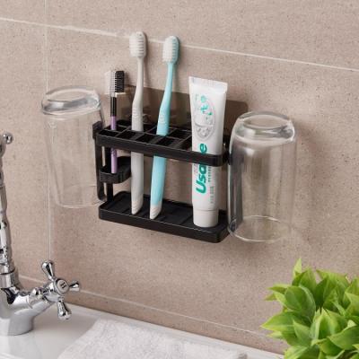 China Sustainable Household Black Self Adhesive Metal Wall Mount Toothpaste And Toothbrush Holder for sale