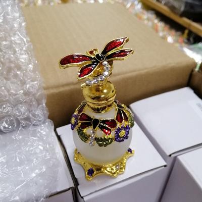 China Personal Care 15ml Patented Dragonfly Zinc Alloy Metal Perfume Bottles Glass Attar Essential Oil Bottles Factory Outlet#70022S- for sale