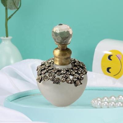 China Personal Care 40ml Metal Models Stones Essential Oil Attar Perfume Bottles Glass Bottles Industrial Refillable Gift Home Decoration for sale