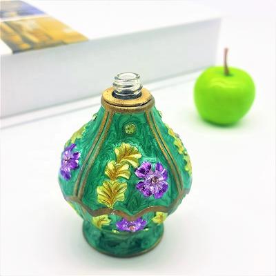 China Personal Home Factory Outlet#12666 Apple Green Glass Refillable Essential Bottle Decoration Patented 6ml 0il Care Metal Attar Perfume for sale