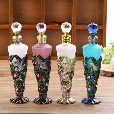 China Personal Care 25ml Hummingbird Perfume Bottle Metal Patented Empty Glass Refillable Attar Bottles Factory Outlet#59811 for sale