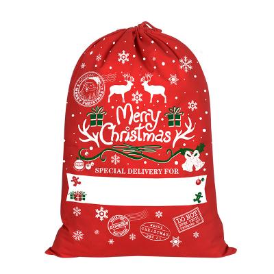 China Canvas Customized Logo Christmas Candy Bags Canvas Santa Sack Drawstring Cotton Sacks Gift for sale