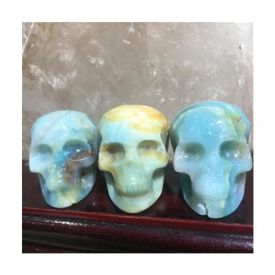 China Europe Hot Selling Natural Carving Opens High Quality Caribbean Calcite Crystal Skulls Carving For Decoration for sale