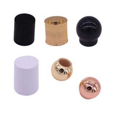 China Non Spill Perfume Cap 15mm Perfume White Flower Cover Black Round PP Insert Perfume Cap for sale